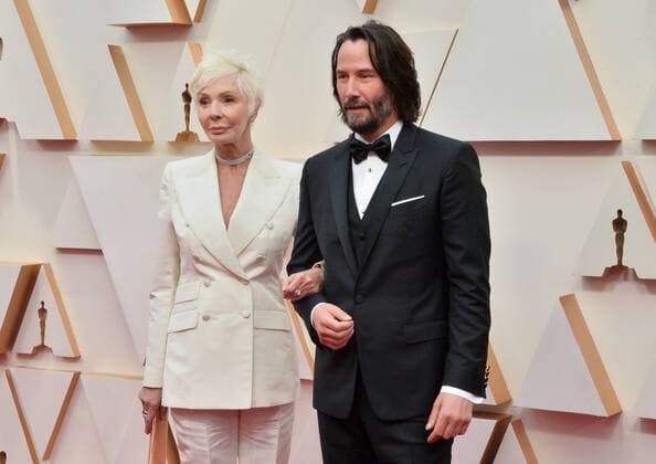 Patricia Taylor (L) and Keanu Reeves arrive for the 92nd annual Academy Awards at the Dolby Theatre in the Hollywood section of Los Angeles on Sunday, February 9, 2020.  LAP20200209652 JIMxRUYMEN