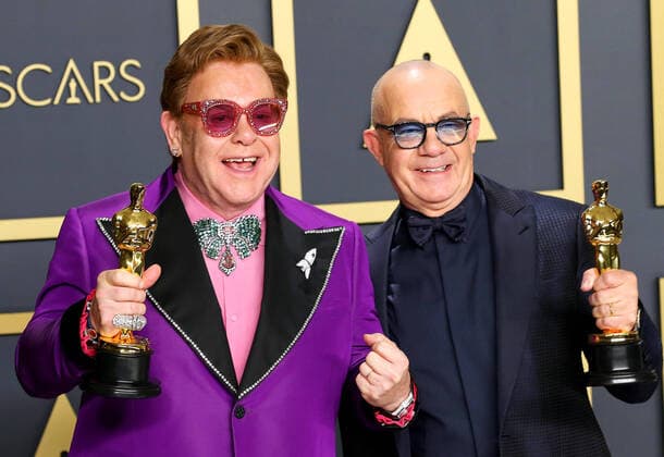 February 9, 2020, Hollywood, CA, USA: HOLLYWOOD, CA - FEBRUARY 9: Bernie Taupin, Elton John pose in the press room during the 92nd Annual Academy Awards at Loews Hollywood Hotel on February 9, 2020 in Hollywood, California. Photo: Christopher Victorio imageSPACE Hollywood USA - ZUMAs181 20200209_zea_s181_277 Copyright: xImagespacex