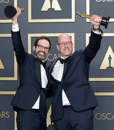 Andrew Buckland (L) and Michael McCusker, winners of Best Film Editing for Ford v Ferrari, appear backstage with their Oscar, during the 92nd annual Academy Awards at Loews Hollywood Hotel in the Hollywood section of Los Angeles on Sunday, February 9, 2020.  LAP202002092047 JOHNxANGELILLO