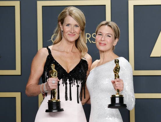 Laura Dern (L), winner of Best Actress in a Supporting Role for Marriage Story, and Renée Zellweger, winner of Best Actress in a Leading Role for Judy, appear backstage with their Oscar during the 92nd annual Academy Awards at Loews Hollywood Hotel in the Hollywood section of Los Angeles on Sunday, February 9, 2020.  LAP20200209890 JOHNxANGELILLO