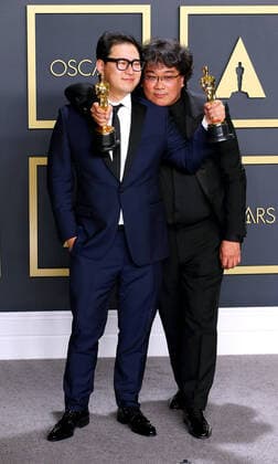 February 9, 2020, Hollywood, CA, USA: HOLLYWOOD, CA - FEBRUARY 9:Bong Joon-ho, Han Jin-won pose in the press room during the 92nd Annual Academy Awards at Loews Hollywood Hotel on February 9, 2020 in Hollywood, California. Photo: Christopher Victorio imageSPACE Hollywood USA - ZUMAs181 20200209_zea_s181_309 Copyright: xImagespacex