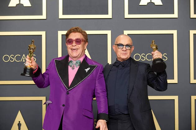 Elton John and Bernie Taupin pose backstage with the Oscar for Original Song during the live ABC Telecast of The 92nd Oscars at the Dolby Theatre in Hollywood, CA on Sunday, February 9, 2020. Los Angeles CA USA  Copyright: xNickxAgrox 339671052PLX
