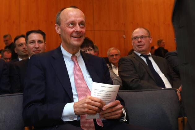 Friedrich Merz CDU laughs CDA award ceremony Roswith Oerter Prize to Heinrich Weiss Owner SMS Group on 10 02 2020 in Siegen Germany