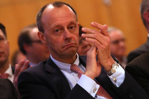 Friedrich Merz CDU applauds, with hanging corners of his mouth CDA award ceremony Roswith Oerter Prize to Heinrich Weiss Owner SMS Group on 10 02 2020 in Siegen Germany