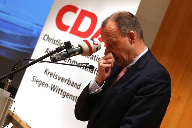 Friedrich Merz CDU takes the nose by the nose CDA Award ceremony Roswith Oerter Prize to Heinrich Weiss Owner SMS Group on 10 02 2020 in Siegen Germany