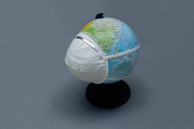 Globe with respirator Globe with respirator, 10 02 2020, Borkwalde, Brandenburg, On a globe there is a respirator