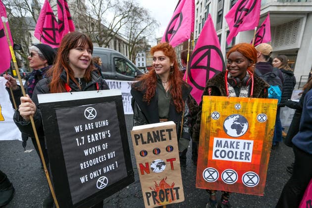 February 15, 2020, London, England, United Kingdom: Extinction Rebellion protesters on the Strand, London as part of a protest against London Fashion Week on Saturday, Feb. 15, 2020. (Photo )..Given the ecological consequences of fast fashion and the impact London Fashion Week has on consumption, the organisation says a boycott is the only way forward to help save our planet..In order to get their message across, the activists will be taking part in several protests during the five-day event in London. London United Kingdom - ZUMAx02_ 20200215_zaf_x02_004 Copyright: xVudixXhymshitix