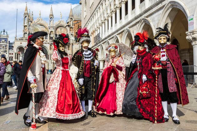 Carnival in Venice 2020 Venice, Italy 15 February 2020 Carnival in Venice with colourful costumes and masks in St Marks Square