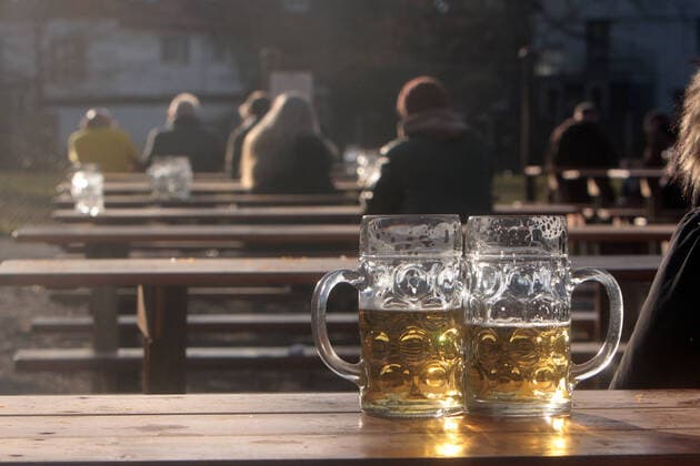 Warm and spring-like temperatures attracted numerous visitors to the beer garden Königlicher Hirschgarten in Munich, Bavaria, Germany