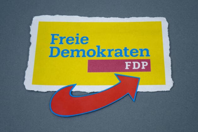 AfD and FDP AfD and FDP, 17 02 2020, Borkwalde, Brandenburg, Germany, Under an FDP logo is an arrow of the AfD