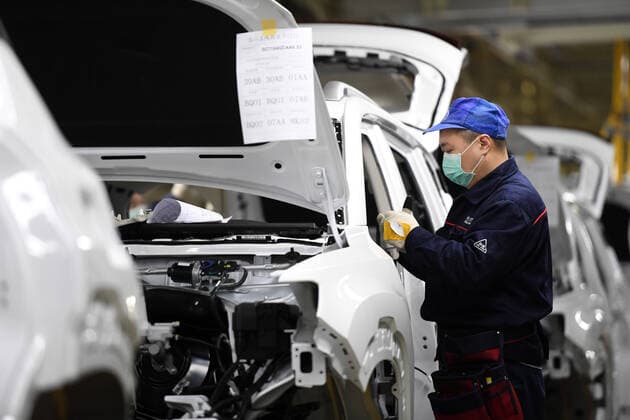 (200218) -- CHONGQING, Feb. 18, 2020 -- A staff member works at a production line of Yubei plant of Chongqing Changan Automobile Co., Ltd. in Chongqing, southwest China, Feb. 18, 2020. A batch of cars rolled off the production line here on Tuesday. As the first batch of new cars produced at the Yubei plant after the outbreak of novel coronavirus, it marked that the Yubei plant of Chongqing Changan Automobile Co., Ltd. officially resumed production. ) CHINA-CHONGQING-CHANGAN AUTOMOBILE-PRODUCTION-RESUMPTION (CN) TangxYi 