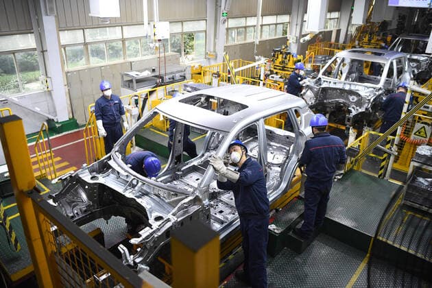 (200218) -- CHONGQING, Feb. 18, 2020 -- Staff members work at a production line of Yubei plant of Chongqing Changan Automobile Co., Ltd. in Chongqing, southwest China, Feb. 18, 2020. A batch of cars rolled off the production line here on Tuesday. As the first batch of new cars produced at the Yubei plant after the outbreak of novel coronavirus, it marked that the Yubei plant of Chongqing Changan Automobile Co., Ltd. officially resumed production. ) CHINA-CHONGQING-CHANGAN AUTOMOBILE-PRODUCTION-RESUMPTION (CN) TangxYi 