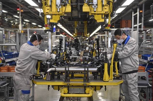(200219) -- CHENGDU, Feb. 19, 2020 -- Staff members work at the assemble plant of FAW-Volkswagen Automobile in Chengdu, southwest China s Sichuan Province, Feb. 19, 2020. FAW-Volkswagen Automobile Co., Ltd. resumed production at its four production bases across China as of Monday amid the novel coronavirus (COVID-19) outbreak. ) CHINA-SICHUAN-CHENGDU-CAR INDUSTRY-PRODUCTION (CN) LiuxKun 