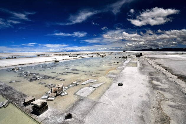 February 13, 2020, Potosi, Bolivia: Bolivian Salar de Uyuni is the world s largest salt flat, and one of the top s bolivian touristic atraction, with 10,582 square kilometers (4,086 sq mi). It is in the province of PotosoÂ­ in southwest Bolivia, near the crest of the Andes at an elevation of 3,656 meters (11,995 ft) above sea level.The crust serves as a source of salt and covers a pool of brine, which is exceptionally rich in lithium. It contains approximatively 50% to 70% of the world s known lithium reserves. However, lithium extraction in the 1980s and 1990s by foreign companies met strong opposition from the local community. Locals believed that the money infused by mining would not reach them. For tourists, it s a point of Rally Dakar and an exceptional landscape. One of the photographic move there since around 15 years is to us - ZUMAl72_ 20200213_znp_l72_017 Copyright: xChristianxLombardix
