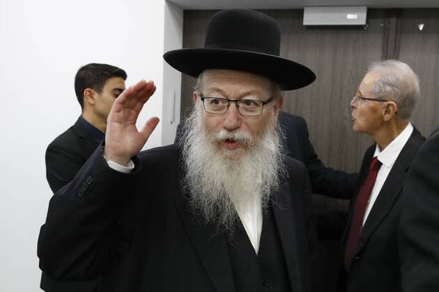 Israeli Health Minister Yaakov Litzman arrives for a situation assessment meeting regarding the Coronavirus (COVID-2019), at the Health Ministry in the Israeli coastal city of Tel Aviv on Sunday, February 23, 2020. Pool  JERX20200223102 JACKxGUEZ