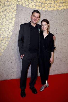 Christian Petzold and Paula Beer at the award ceremony of the Order of Knights for Art and Literature at the Soiree Francaise du Cinema during the Berlinale in the French Embassy on 24 02 2020 in Berlin Berlin Berlinale 2020 Soiree Francaise du Cinema Award of the Order Chevalier des Arts et des Lettre in Berlin