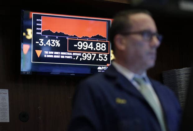 Traders work on the the floor of the New York Stock Exchange at the closing bell on Wall Street in New York City on Monday, February 24, 2020. Stocks fell sharply on Monday with Dow Jones Industrial Average closing down over 1,000 points on possible fears from the coronavirus outbreak.  NYP20200224135 JOHNxANGELILLO