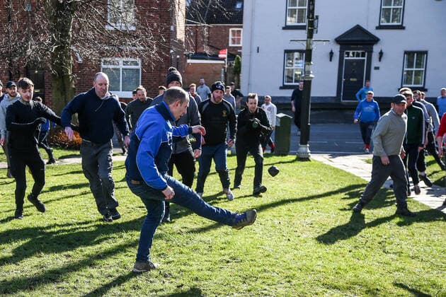. 25 02 2020. Sedgefield, United Kingdom. The traditional Shrove Tuesday Ball Game in Sedgefield. Where a small, leather ball is chased around the village for hours.  xTomxBanksx xi-Imagesx IIM-20824-0008