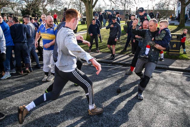 . 25 02 2020. Sedgefield, United Kingdom. The traditional Shrove Tuesday Ball Game in Sedgefield. Where a small, leather ball is chased around the village for hours.  xTomxBanksx xi-Imagesx IIM-20824-0022