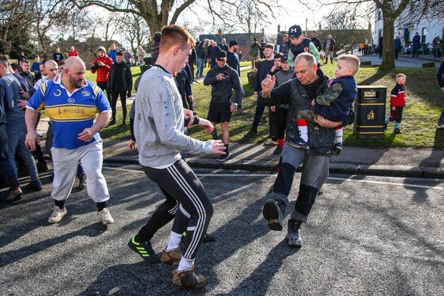 . 25 02 2020. Sedgefield, United Kingdom. The traditional Shrove Tuesday Ball Game in Sedgefield. Where a small, leather ball is chased around the village for hours.  xTomxBanksx xi-Imagesx IIM-20824-0023