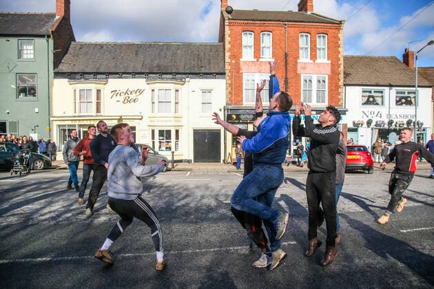 . 25 02 2020. Sedgefield, United Kingdom. The traditional Shrove Tuesday Ball Game in Sedgefield. Where a small, leather ball is chased around the village for hours.  xTomxBanksx xi-Imagesx IIM-20824-0024