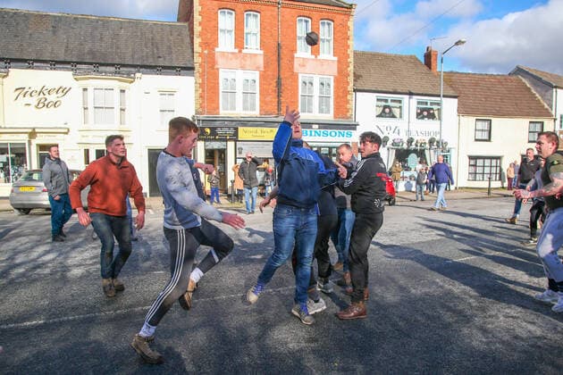 . 25 02 2020. Sedgefield, United Kingdom. The traditional Shrove Tuesday Ball Game in Sedgefield. Where a small, leather ball is chased around the village for hours.  xTomxBanksx xi-Imagesx IIM-20824-0025