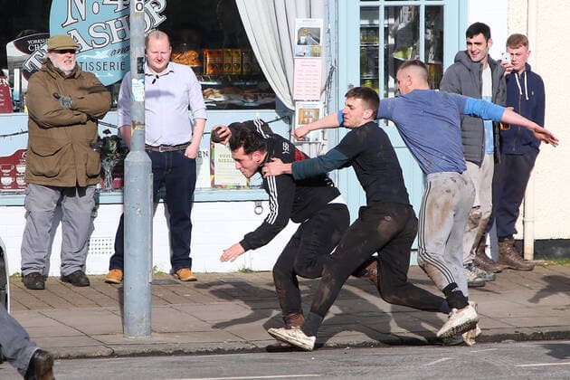 . 25 02 2020. Sedgefield, United Kingdom. The traditional Shrove Tuesday Ball Game in Sedgefield. Where a small, leather ball is chased around the village for hours.  xTomxBanksx xi-Imagesx IIM-20824-0028