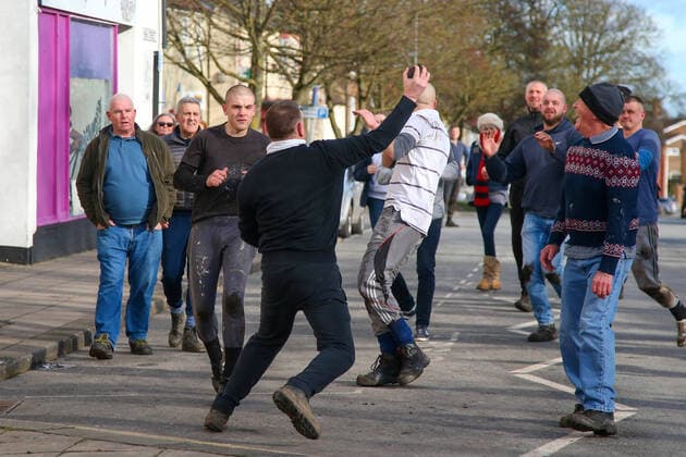 . 25 02 2020. Sedgefield, United Kingdom. The traditional Shrove Tuesday Ball Game in Sedgefield. Where a small, leather ball is chased around the village for hours.  xTomxBanksx xi-Imagesx IIM-20824-0040
