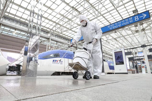 (200225) -- SEOUL, Feb. 25, 2020 -- Staff members conduct disinfection operation at the platform of a railway station in Seoul, South Korea, Feb. 25, 2020. South Korea confirmed 144 more cases of the COVID-19 on Tuesday, raising the total number of infections to 977, and the death toll rose to 10. (NEWSIS Handout via Xinhua) SOUTH KOREA-COVID-19-INFECTIONS NiuxXisitongxunshe 