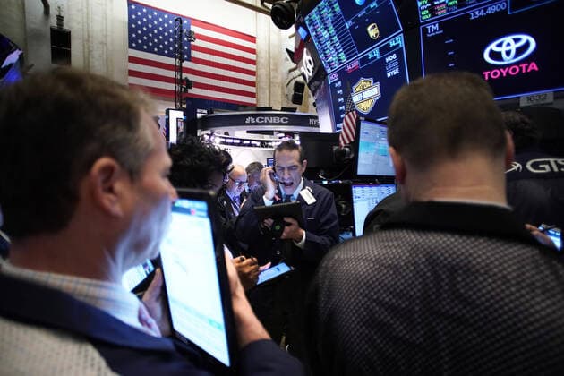 Traders work on the the floor of the New York Stock Exchange at the opening bell on Wall Street in New York City on Tuesday, February 25, 2020. Stocks fell slightly on Tuesday after a failed early attempt at recovering some of the lost ground from the Monday session which was the market s worst day in two years. Stocks fell sharply the day before with Dow Jones Industrial Average closing down over 1,000 points on possible fears from the coronavirus outbreak.  NYP20200225104 JOHNxANGELILLO
