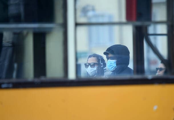 (200227) -- MILAN, Feb. 27, 2020 (Xinhua) -- People wear face masks in Milan, Italy, Feb. 26, 2020. A total of 400 people have tested positive for the novel coronavirus in Italy till Wednesday evening. The government has placed 11 towns, 10 in Lombardy and one in Veneto, under lockdown in an effort to contain the epidemic. (Photo by Daniele Mascolo Xinhua) ITALY-MILAN-COVID-19 