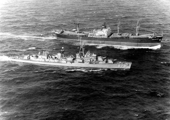 CUBAN MISSILE CRISIS- Off coast of Cuba: The U.S.S. Vesole stears alongside the Soviet freighter Polznuov, for inspection of her cargo. On the deck are large ablong missile-like objects, two of which are partially uncovered, November 10, 1962 - CPL Arch CPL Archives Everett Collection PUBLICATIONXNOTxINxCANxCHNxFRAxITAxJPNxNORxPOLxRUSxESPxUKxUSA Copyright: xCPLxArchives EverettxCollectionx HBDCUMI CL003