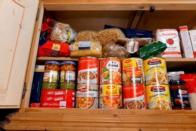27 02 2020, Hamster purchases due to corona virus, the storage cupboard in a household in Mindelheim Bavaria is full of tins and noodles to bridge a possible corona pandemic in Germany 27 02 2020, Hamster purchases due to corona virus 27 02 2020, Hamster purchases due to corona virus