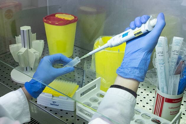 Symbol photo, laboratory, coronavirus, corona virus, protective clothing, warning sign, biohazard