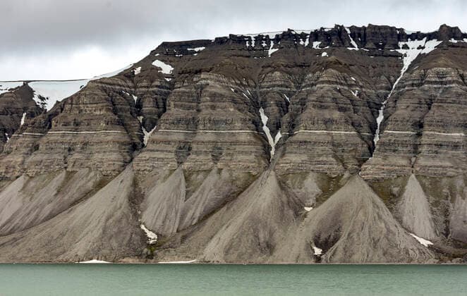 Large alluvial fans along wall of Tempelfjorden, Spitsbergen, Svalbard, Arctic, Norway, Europe Copyright: TonyxWaltham 29-5565