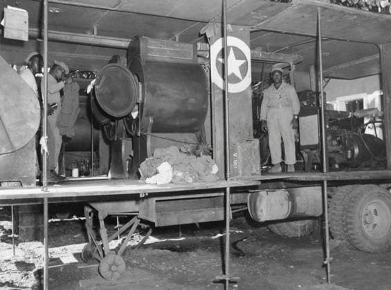 African American soldiers assigned to a mobile washing unit, of the 549th Quartermaster Laundry. They are with the Seventh Army, Poligny Area, France. Sept 22, 1944. World War 2. (BSLOC_2014_10_230) For usage credit please use; PUBLICATIONXNOTxINxCANxCHNxFRAxITAxJPNxNORxPOLxRUSxESPxUKxUSA Copyright: xCourtesyxEverettxCollectionx HISL037 EC925