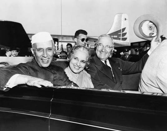 Prime Minister Jawaharlal Nehru of India and President Harry Truman in open car. Between them is Nehru s sister, Madame Vijaya Lakshmi Pandit, India s ambassador to the U.S. Oct. 11, 1949. - (BSLOC_2014_15_102) For usage credit please use; PUBLICATIONXNOTxINxCANxCHNxFRAxITAxJPNxNORxPOLxRUSxESPxUKxUSA Copyright: xCourtesyxEverettxCollectionx HISL038 EC650