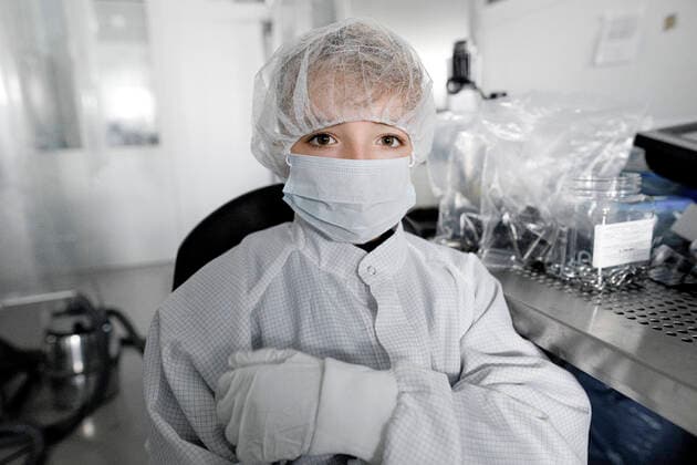 Portrait of a boy in workwear in a laboratory model released Symbolfoto property released  KMKF01214