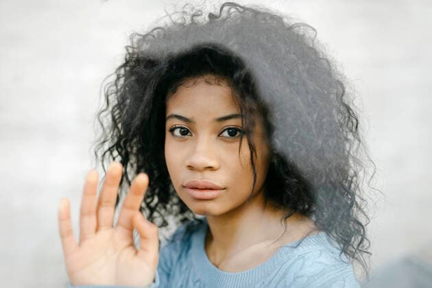 Portrait of a beautiful young woman behind glass pane model released Symbolfoto  TCEF00080