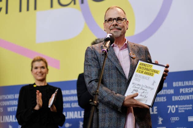Director David France with the Amnesty International Film Award for the film WELCOME TO CHECHNYA on the occasion of the award ceremony of independent juries of the 70 Berlin International Film Festival snapshot photography xK M Krause
