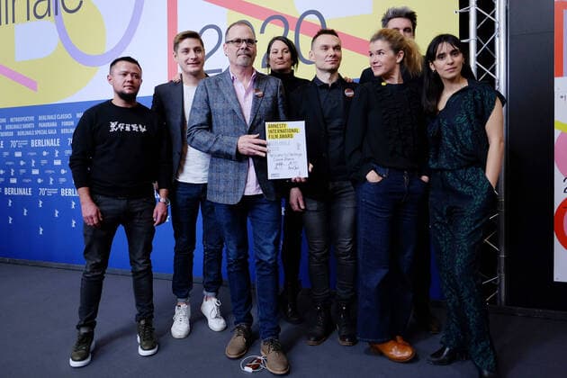 Director David France with the Amnesty International Film Award for the film WELCOME TO CHECHNYA on the occasion of the award ceremony of independent juries of the 70 Berlin International Film Festival snapshot photography xK M Krause