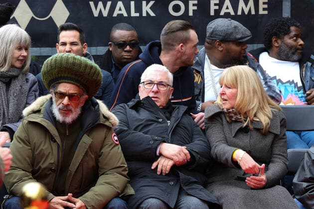 March 4, 2020, London, United Kingdom: Film director, Don Letts, Amy Winehouse s father, Mitch Winehouse and Amy Winehouse s mother, Janis Winehouse (l to r) during the unveiling of Amy Winehouse s stone, in honour of the late British singer at the Music Walk of Fame in Camden, in north London. London United Kingdom - ZUMAs197 20200304_zaa_s197_184 Copyright: xStevexTaylorx