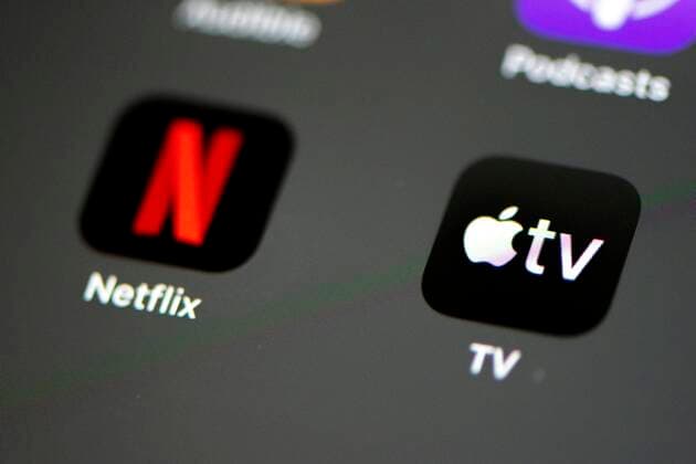 Apple TV App, Netflix App, Video Streaming Service, App Icon, Display, iPhone, iOS, Smartphone, Close-up, Detail, Germany, Europe Copyright: imageBROKER/NathaliexLieckfeld iblnal05124980.jpg