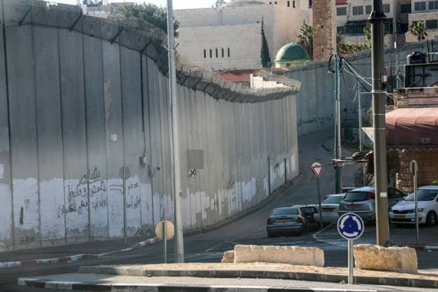 March 8, 2020, Jerusalem, West Bank, Palestinian Territory: A picture shows a side of the Israeli separation wall arround Jerusalem in Jerusalem s Old city,on March 8, 2020. In June 2002, the Israeli cabinet decided to construct the separation wall. The decision was made following a long string of attacks perpetrated by Palestinians against Israelis. The declared objective was preventing Palestinians without permits from entering Israel from the West Bank. However, the establishment of the barrier was also intended to serve other, undeclared aims. A key factor in determining the barrier™s route was the location of settlements, thereby laying the groundwork for the de facto annexation of most of the settlements and much land for their future expansion Jerusalem Palestinian Territory - ZUMAap3_ 20200308_zaf_ap3_238 Copyright: xMuhammedxQaroutxIdkaidekx