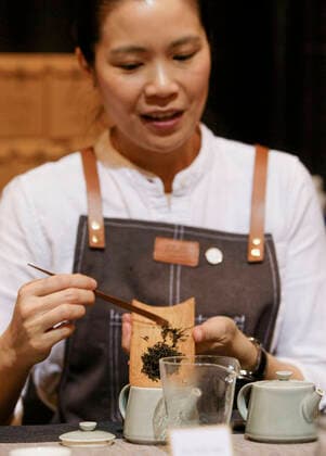 (200308) -- VANCOUVER, March 8, 2020 (Xinhua) -- An exhibitor demonstrates tea preparing during the sixth annual Vancouver Tea Festival in Vancouver, Canada, March 8, 2020. The Vancouver Tea Festival returned for the sixth year this weekend, featuring tea manufacturers, connoisseurs and vendors exhibiting different types of tea from around the world. (Photo by Liang Sen Xinhua) CANADA-VANCOUVER-TEA FESTIVAL 