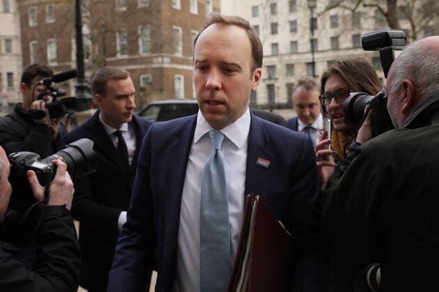 (200309) -- LONDON, March 9, 2020 (Xinhua) -- Britain s Secretary of State for Health and Social Care Matt Hancock (front) arrives for a COBRA meeting at the Cabinet Office, in London, Britain on March 9, 2020. Earlier Monday, British Prime Minister Boris Johnson chaired a second meeting of the government s COBRA emergency committee to tackle the COVID-19 outbreak. (Photo by Tim Ireland Xinhua) BRITAIN-LONDON-COVID-19-COBRA MEETING 