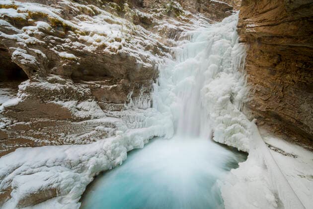 Johnston Canyon Frozen Waterfall in Winter Banff, AB, Canada CR_SHKO200116-286148-01