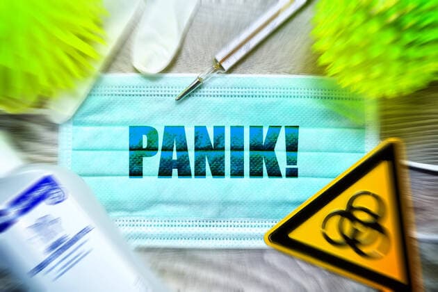 PHOTOMONAY, mouthguard with the writing Panic, biohazard sign, protective gloves, clinical thermometer and disinfectant on a table, symbol photo Coronavirus ** NUR FUER REDAKTIONELLE ZWECKE ** EDITORIAL USE ONLY **