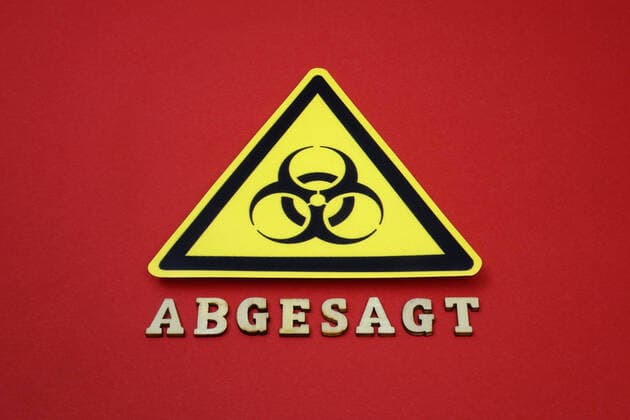 Biohazard and cancelled Biohazard and cancelled, 12 03 2020, Borkwalde, Brandenburg, Germany, Under the symbol of Biohazard is the lettering cancelled