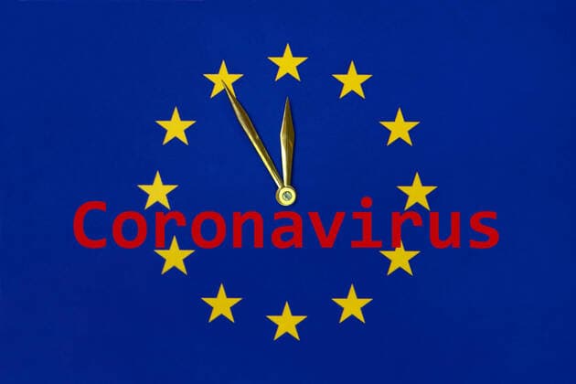 Clock hands 5 to 12 and Coronavirus Clock hands 5 to 12 and Coronavirus, 13 03 2020, Borkwalde, Brandenburg, Germany, On an EU flag, clock hands with the symbolic time of 5 to 12 and the mounted lettering Coronavirus